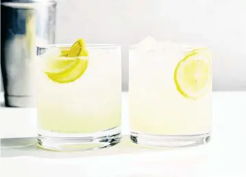  ?? DAVID MALOSH/SIMON ANDREWS NYT ?? Lemon is an easy way to balance cocktails, as in this hard lemonade that’s both reminiscen­t of and far removed from the spiked six packs of yore.