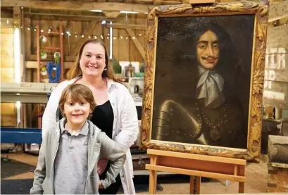  ??  ?? Liz Vella with son Dylan and the painting of King Charles II after it was restored on BBC One’s The Repair Shop