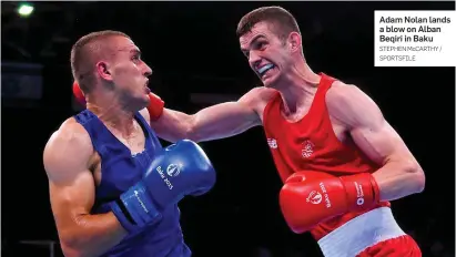  ?? STEPHEN McCARTHY / SPORTSFILE ?? Adam Nolan lands a blow on Alban Beqiri in Baku