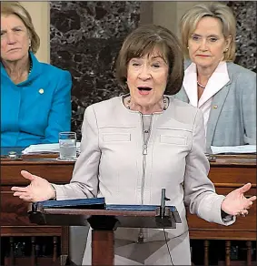  ?? AP/Senate TV ?? Sen. Susan Collins, R-Maine, speaks on the Senate floor about her decision to vote for Supreme Court nominee Brett Kavanaugh. Republican Sens. Shelly Capito (left) and Sen. Cindy Hyde-Smith are in the background.