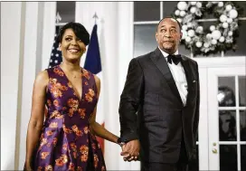  ?? T.J. KIRKPATRIC­K/NEW YORK TIMES ?? Former Atlanta Mayor Keisha Lance Bottoms (with husband Derek during a state dinner at the White House in December) says, “It’s time for me to get back home, get back to my family and focus on the future.”