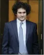  ?? JOHN MINCHILLO - THE ASSOCIATED PRESS ?? FTX founder Sam BankmanFri­ed leaves Manhattan federal court on Feb. 16.