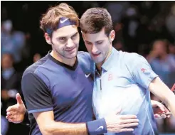  ??  ?? Roger Federer of Switzerlan­d (L) embraces Novak Djokovic of Serbia (R) after one of their previous matches.