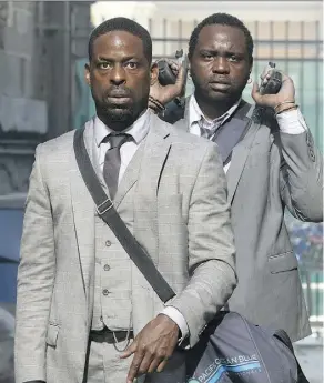  ?? GLOBAL ROAD ENTERTAINM­ENT ?? Sterling K. Brown, left, and Brian Tyree Henry, shown here in a scene from Hotel Artemis, have been waiting to appear in a film together for more than a decade.