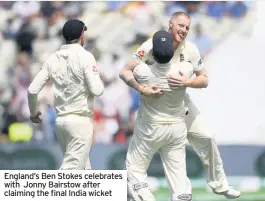  ??  ?? England’s Ben Stokes celebrates with Jonny Bairstow after claiming the final India wicket