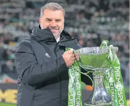  ?? ?? Lifting the League Cup gave Ange Postecoglo­u the hunger for more