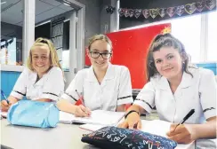  ?? PHOTO: KAYLA HODGE ?? Mobile free . . . New Waitaki Girls’ High School year 9 pupils (from left) Neve Mavor, Hayley Hamilton (both 12) and Molly O’Sullivan (13) study without their phones in their German class.