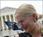  ?? OLIVIER DOULIERY AFP VIA GETTY IMAGES ?? A pro-choice supporter cries outside the U.S. Supreme Court in Washington, D.C., on Friday.