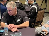  ?? BOB GROTZ — 21ST-CENTURY MEDIA PHOTO ?? Eagles offensive line coach Jeff Stoutland talks with reporters at the Sheraton Grand Hotel at Wild Horse Pass in Phoenix.