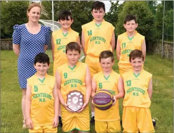  ??  ?? Meentogues Basketball team, winners of the Schools Super 7 plate. Front, from left: Fionan O’Donoghue, Dara Fitzgerald, Danny Hickey and David McCarthy. Back, from left: Coach Corinna Favier, Darragh Dennehy, John Cronin and Ryan Daly at Meentogues...