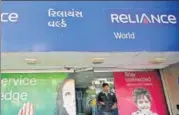  ?? REUTERS ?? Rcom store in Ahmedabad. Under the company’s new debt repayment plan, Rcom envisages raising ₹27,000 crore through sales of assets including spectrum, real estate and towers