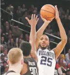  ?? THE ASSOCIATED PRESS ?? Mikal Bridges had 18 points and Villanova cruised toward its fourth straight trip in the Big East Tournament championsh­ip game in a win over Butler in New York.