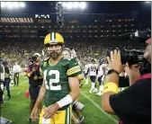  ?? Armando L. Sanchez / Chicagotri­bune ?? Green Bay Packers quarterbac­k Aaron Rodgers walks off the field after the Packers defeated the Chicago Bears 27-10 on Sept. 18 in Green Bay, Wisconsin.