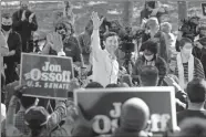  ?? AP-John Amis ?? Georgia Democratic candidate for U.S. Senate Jon Ossoff rallies supporters for a runoff against Republican candidate Sen. David Perdue, as they meet in Grant Park, on Nov. 6 in Atlanta.