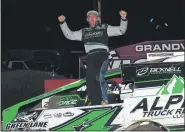  ?? RICH KEPNER - FOR MEDIANEWS GROUP ?? Brian Hirthler lets out a celebrator­y yell in victory lane after clinching the Sportsman season championsh­ip Saturday night at Grandview Speedway.