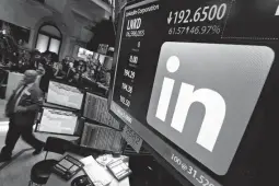  ?? Associated Press ?? The LinkeIn logo appears on a screen Monday at the New York Stock Exchange.