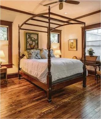  ?? Michael Hart photos ?? Contractor Rob Hellyer of Premier Remodeling found reclaimed old-growth pine flooring for the bedroom, matching what was in the original part of the home.