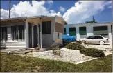  ?? SARAH PETERS / THE PALM BEACH POST ?? Mobile homes are boarded up in Monet Acres in Palm Beach Gardens on Thursday as Hurricane Irma approached.