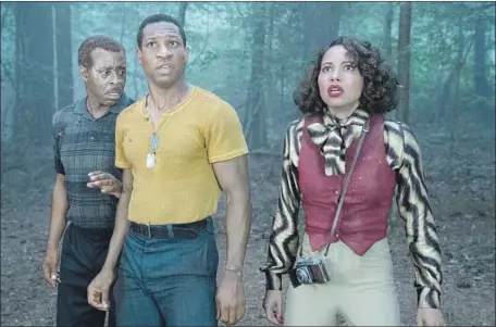  ?? Eli Joshua Ade HBO ?? COURTNEY B. Vance, left, Jonathan Majors and Jurnee Smollett encounter strange doings in the HBO sci-fi series “Lovecraft Country.”