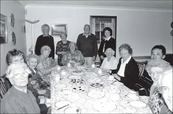  ?? B16twe05 ?? Jean and Roger Peacock hosted a dinner for Contact the Elderly in their Brodick home. Pictured are Jean and Roger along with Alex McIntosh, Margaret White, Mary MacDonald, Minnie Coney, Margaret Gray, Eileen Turton, Peggy Dutton, Jan Schofield and Ruth...