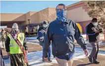  ?? ROBERTO E. ROSALES/JOURNAL ?? Navajo Nation President Jonathan Nez visits the Chinle Comprehens­ive Healthcare Facility in Arizona in December to oversee the first delivery of COVID-19 vaccines to the Navajo Nation.