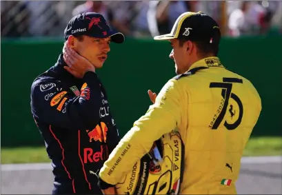  ?? ?? Ferrari’s Charles Leclerc, right, chats to Max Verstappen after grabbing pole at the Italian Grand Prix