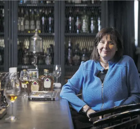  ?? Lau ra Pedersen / National Post ?? Joanna Scandella, Crown Royal master blender and the inventor of Crown Royal’s Northern Harvest Rye,
has spent more than 25 years in production planning at Diageo’s lab in Lasalle, southwest of Montreal.