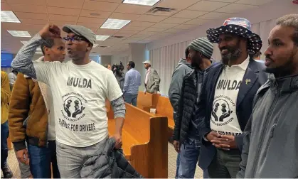  ?? Photograph: Trisha Ahmed/AP ?? Rideshare drivers celebrate in Minneapoli­s, Minnesota, on 7 March 2024, after city council voted to pass a measure that would increase wages.