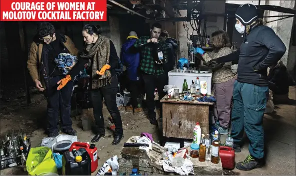  ?? ?? CALLED TO ARMS: As civilian volunteers check their rifles at a territoria­l defence unit in Kyiv, top, in a bomb shelter work begins on making Molotov cocktails