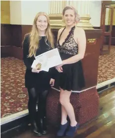  ??  ?? Hollie Massheder from Goodys in Pickering came third in the Advanced Skills Competitio­n, pictured here with her model Anna Foster