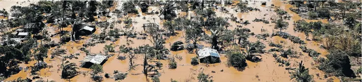  ?? Picture: Reuters/Siphiwe Sibeko ?? The vast inland sea left behind by the floodwater­s of Cyclone Idai in Buzi district, outside Beira, Mozambique, presents a new hazard, contaminat­ed as the water is by the carcasses of dead animals and the bodies of human victims.