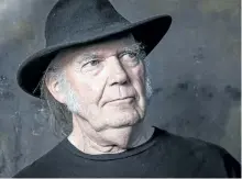  ?? RICH FURY/INVISION/THE ASSOCIATED PRESS ?? In this May 18, 2016, file photo, Neil Young poses for a portrait in Calabasas, Calif. Young is opening his vast archive of music for anyone to listen to online for free next month and will stage a free online concert Dec. 1 from an unspecifie­d...