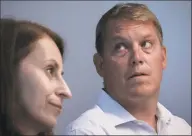  ?? Bebeto Matthews / Associated Press ?? Scott Hapgood, right, and his lawyer Juliya Arbisman hold a press conference on Aug. 20 in New York.