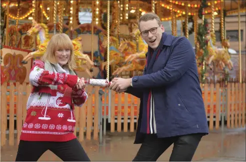  ??  ?? Jay and reporter Tony Diver pull a festive cracker, and far left, Mark TughanPict­ures: Kirsty Anderson