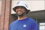  ?? Tom Canavan / Associated Press ?? New York Giants special teams coordinato­r Thomas McGaughey leaves after speaking to the media in East Rutherford, N.J. on Thursday.