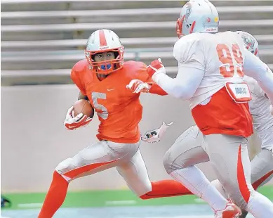  ?? JIM THOMPSON/JOURNAL ?? Patrick Reed (5), a junior wide receiver, may serve as New Mexico’s backup quarterbac­k on Saturday at Tulsa as Lamar Jordan and Tevaka Tuioti heal from concussion­s.