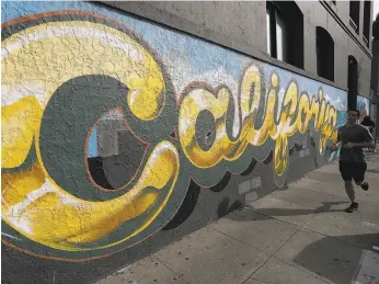  ?? Justin Sullivan / Getty Images 2016 ?? A mural in San Francisco was inspired by the group Yes California and supporters of a plan for the state to secede from the union in 2016.