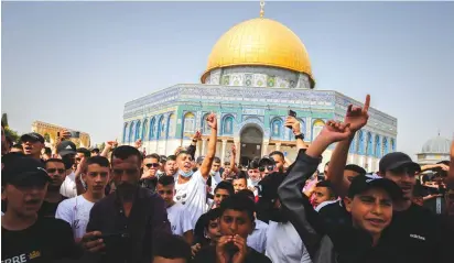  ?? (Jamal Awad/Flash90) ?? PALESTINIA­NS PROTEST against an Israeli judge’s approval of ‘quiet’ Jewish prayer on the Temple Mount, in October.