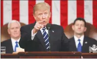  ?? AP PHOTO ?? President Donald Trump addresses a joint session of Congress on Capitol Hill in Washington on Feb. 28, 2017, as Vice President Mike Pence and House Speaker Paul Ryan listen.