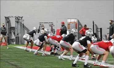  ??  ?? Ohio State quarterbac­ks Jack Miller, C.J. Stroud and Kyle Mccord are all vying to replace Justin Fields as the starter.