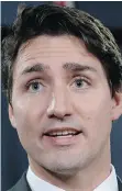  ?? ADRIAN WYLD/THE CANADIAN PRESS ?? Prime Minister Justin Trudeau said Wednesday his government would continue to invest in growth to stimulate the economy.