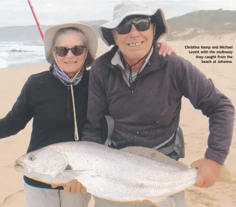  ??  ?? Christina Kemp and Michael Levett with the mulloway they caught from the beach at Johanna.