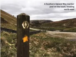  ??  ?? A Southern Upland Way marker post on the track. heading north-east