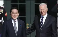  ?? SUSAN WALSH - THE ASSOCIATED PRESS FILE ?? President Joe Biden greets Japanese Prime Minister Fumio Kishida on the South Lawn of the White House in January. Biden will attend the Group of Seven summit this week, and Kishida is this year’s host.