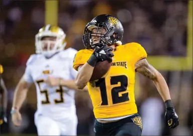  ?? / KSU Athletics-Kyle Hess ?? Former Chattooga star Isaac Foster returns a kickoff for a touchdown during last Saturday’s 62-13 win against Alabama State.