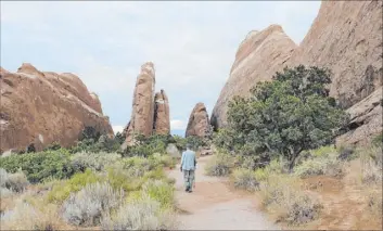  ??  ?? Landscape Arch Trail is an easy 1.6-mile round-trip with minimal elevation gain.