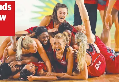  ?? Pictures: GETTY IMAGES ?? UPSET: Delighted England players celebrate. Below: Geelong’s Madi Robinson (right) receives her medal.