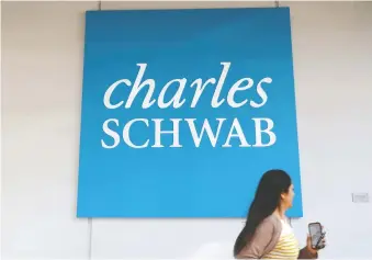  ?? JUSTIN SULLIVAN/GETTY IMAGES ?? A smaller-yet-more-valuable stake in major online brokerage Schwab, once its deal with TD Ameritrade closes, could give TD some added firepower for mergers and acquisitio­ns of its own.