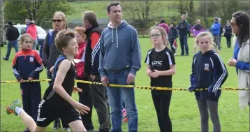  ??  ?? Myles Hewlett of United Striders sprinting for home in the boys’ Under-13 700 metres.