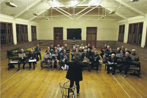  ?? PHOTO: LINDA ROBERTSON ?? On a final note . . . The Dunedin RSA Choir rehearses last night at the Caversham Presbyteri­an Church’s Sidey Hall. The choir will use a temporary rehearsal space before April 25, when it performs its centenary Anzac Revue in the Dunedin Town Hall.